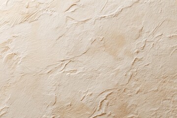 Light cream colored plaster wall with subtle texture for elegant design.
