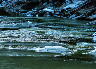 Sugar River in New Hampshire flowing with ice and snow.