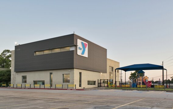 The Y YMCA gym business storefront exterior and parking lot Houston, Texas USA 08-10-2025.