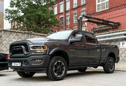 Grey Dodge Ram TRX 2500 parking at the city street. Powerful American pickup Dodge Ram TRX on parking lot. Exterior of the grey color Dodge Ram TRX 6.2 supercharge. 