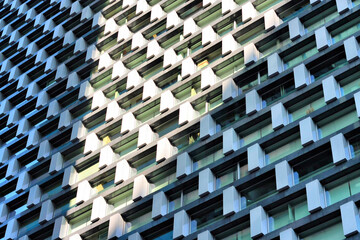 Modern Building Facade with Geometric Window Pattern © Mikhail