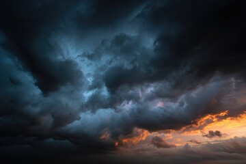 Moody cloudscape with layered dramatic storm clouds at twilight.