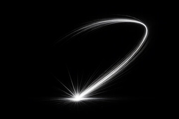 Obraz premium Dynamic white light streak forming a curved trail on black background