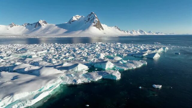 Arctic glaciers and snow-capped mountains Magnificent aerial photography of Antarctic icebergs