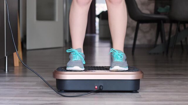 Engaging workout routine using a vibration plate for fitness and muscle toning