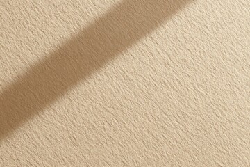 Smooth warm beige solid color background with even studio lighting, soft natural shadows, clean minimal high-resolution texture.