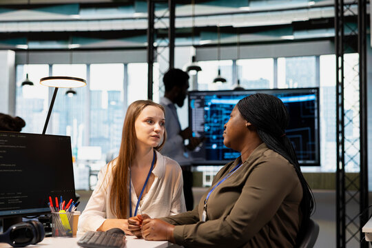 Team members confiding personal struggles during office break, offering mutual reassurance. Coworkers nurturing deep workplace friendships by sharing challenges and supporting one another