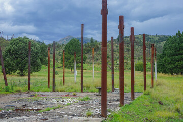 Remains of a burnt down building from wildfires in Lincoln National Forest outside Capitan, New Mexico