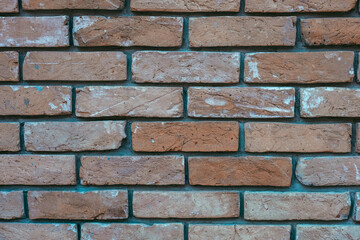 Obraz premium Brick wall texture in warm tones showcasing rustic design elements for interior or exterior use
