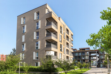 Cityscape of a residential area with modern apartment buildings, new green urban landscape in the...