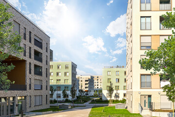 Cityscape of a residential area with modern apartment buildings, new green urban landscape in the city
