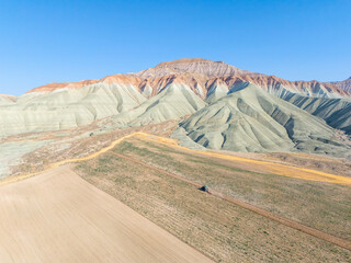 Aerial view of Nallıhan’s Rainbow Hills near Ankara. Unique colorful formations create a stunning landscape, perfect for nature lovers, tourism, and outdoor activities.