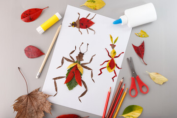 Creative nature craft with insect designs made from colored leaves. Great for art schools, DIY craft kits, and businesses offering nature-based learning or seasonal projects for kids and families