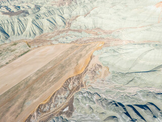Fototapeta premium Nallıhan aerial view of vast agricultural fields blending with unique layered hills, showcasing nature's beauty and geological formations in Ankara, Turkey. Perfect for nature and travel themes.