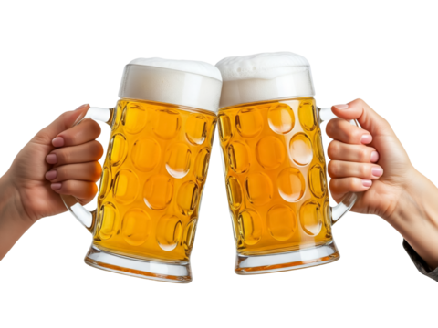 Two girls toasting glasses of beer in cheers gesture, splashing out.