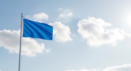 Blue Flag Waving in the Wind Against a Bright Sky with Fluffy Clouds and Sunshine