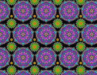 Colorful flower Mandala background pattern with green yellow, purple and black
