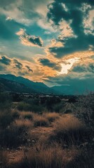 Obraz premium A beautiful mountain range with a cloudy sky