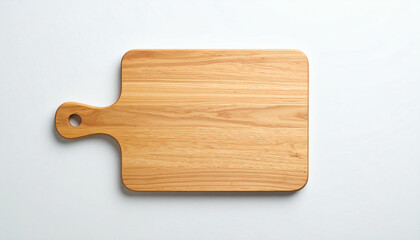 Fototapeta premium A light-colored wooden cutting board with a handle, viewed from above on a plain background.