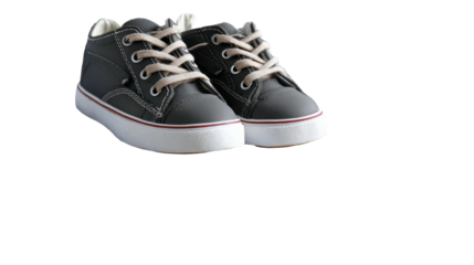 Kids shoes and school uniform folded neatly on white background