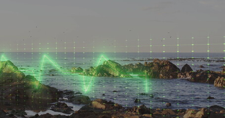 Lapping waves flowing through tidal pools on rocky shore, with neon green digital grid overlay