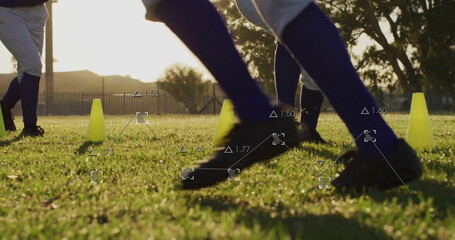 Running baseball player wearing white pants and cleats on grass field, with cones and data overlay