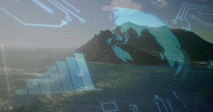 Fototapeta Mountain ridge rising at seaside, with digital globe, bar chart, circuit icons and grid overlay