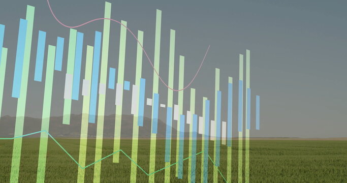 Fototapeta Displaying data overlay floating over grassland toward hills, with translucent bars and line graphs