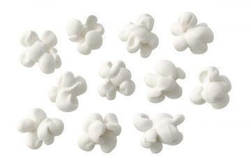 Popcorn kernels bursting against a clear backdrop, ideal for snack and entertainment imagery