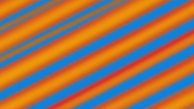 Diagonal stripes of orange and blue create a blurred, repeating pattern.