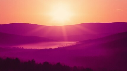 Obraz premium Sunrise over misty mountains