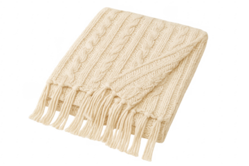 Folded knitted cable throw blanket with tassels on transparent background