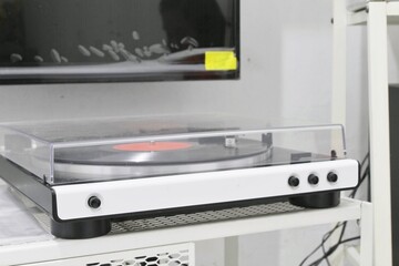 Modern Record Player with Vinyl Disc in a Contemporary Home Setting