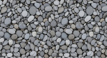 Close-up of Smooth Gray Beach Stones and Pebbles Background