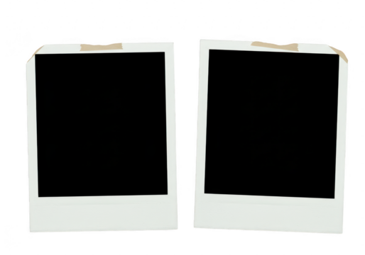 Two empty instant photo frames with tape isolated on transparent background