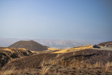 March 25 2025 Burnt Grassland Landscape Under a Clear Blue Sky, Japan