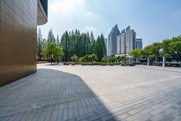 modern business office buildings with empty road,empty concrete square floor	

