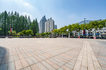 modern business office buildings with empty road,empty concrete square floor	
