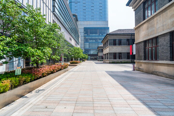 modern business office buildings with empty road,empty concrete square floor	
