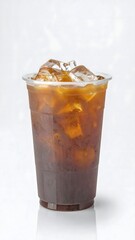 A refreshing iced coffee beverage in a clear plastic cup filled with ice cubes on a plain background.