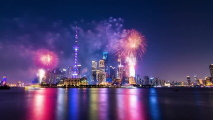 Shanghai's skyline illuminated with fireworks extravaganza over Huangpu River night scene display