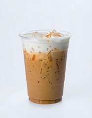 Iced coffee drink with cream and ice in a clear plastic cup.