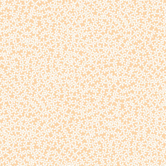 Seamless pattern of white daisies on pastel orange background