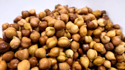 Soaked Brown Chickpeas (Kala Chana) on White Background – High-Protein Pulses