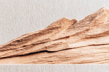 Light beige textured paper background with a sculpted, light brown, layered mountain range