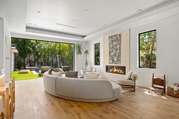 Contemporary luxury home with open layout, designer finishes, and seamless indoor-outdoor living