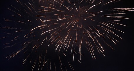 Golden Firework celebrate anniversary happy new year 2025, 4th of july holiday festival. Gold firework in the night time celebrate national holiday. Countdown to new year 2025 gold party time event