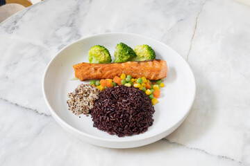 Healthy rice with vegetables and spices in a bowl