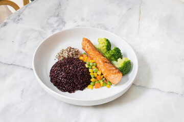 Healthy rice with vegetables and spices in a bowl