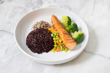 Healthy rice with vegetables and spices in a bowl